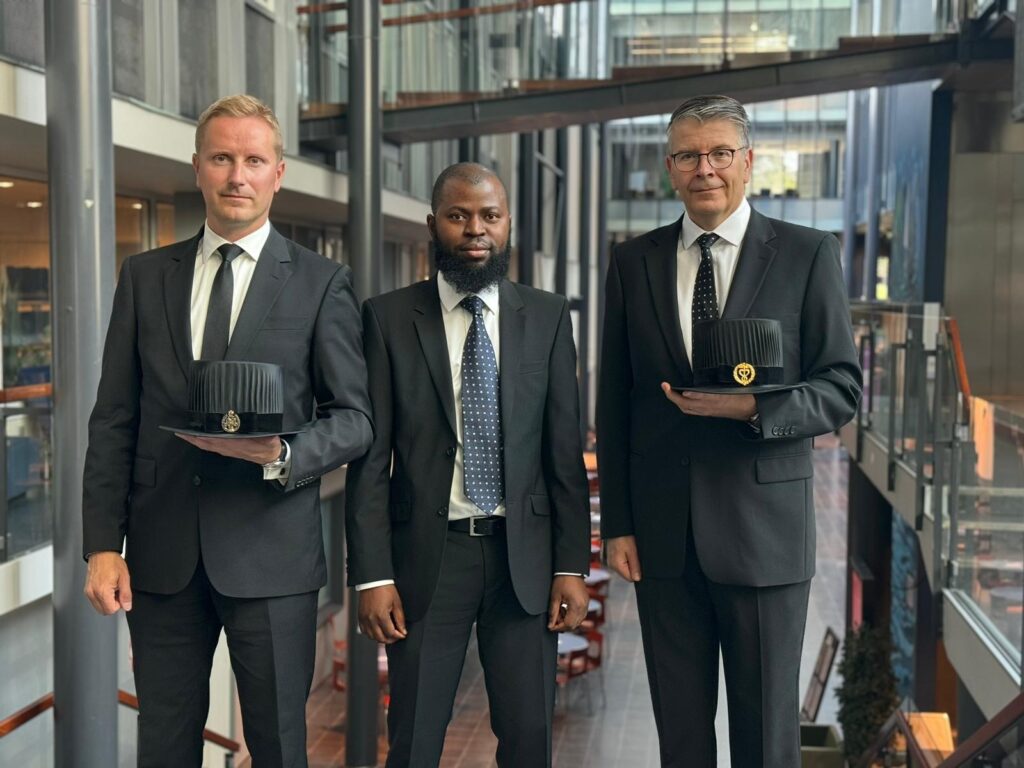 Picture of Doctoral Candidate Habeeb Yahya (middle), Opponent, Professor Sami Vähämaa from University of Vaasa (on the left), and Custos, Professor Mika Vaihekoski (on the right)